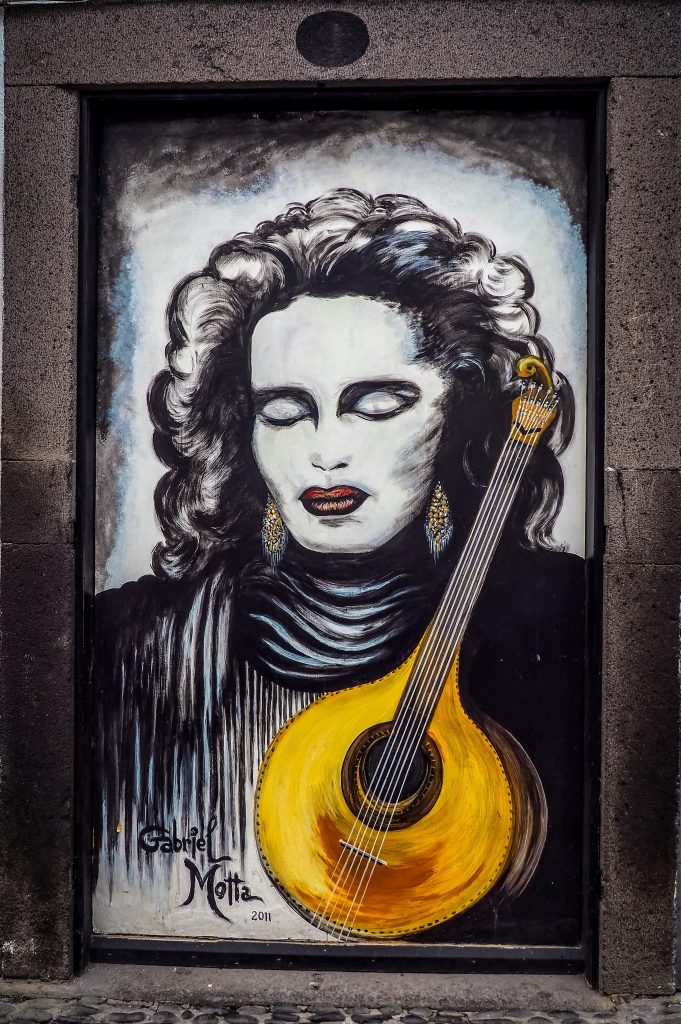 Painting of a woman with guitar