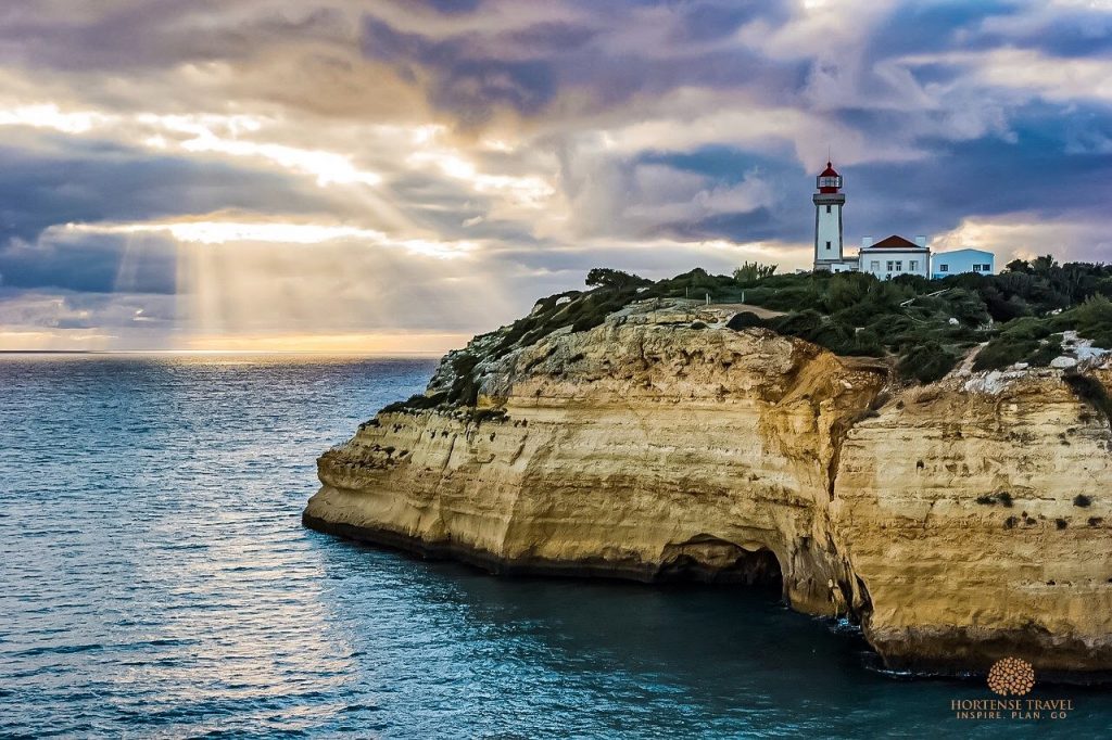A beautiful cliff and a lighthouse in the Algarve, Portugal